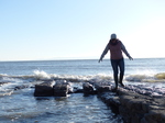 FZ011819 Jenni with waves on Llantwit Major beach.jpg